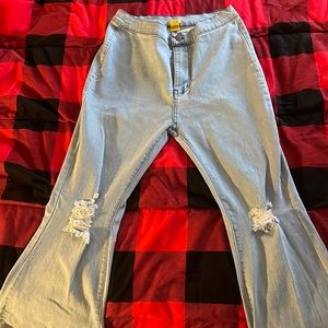 These flared out jeans have never been worn and is a XL